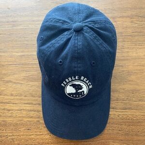 Official Pebble Beach navy blue hat. Snap buckle tassel adjustment